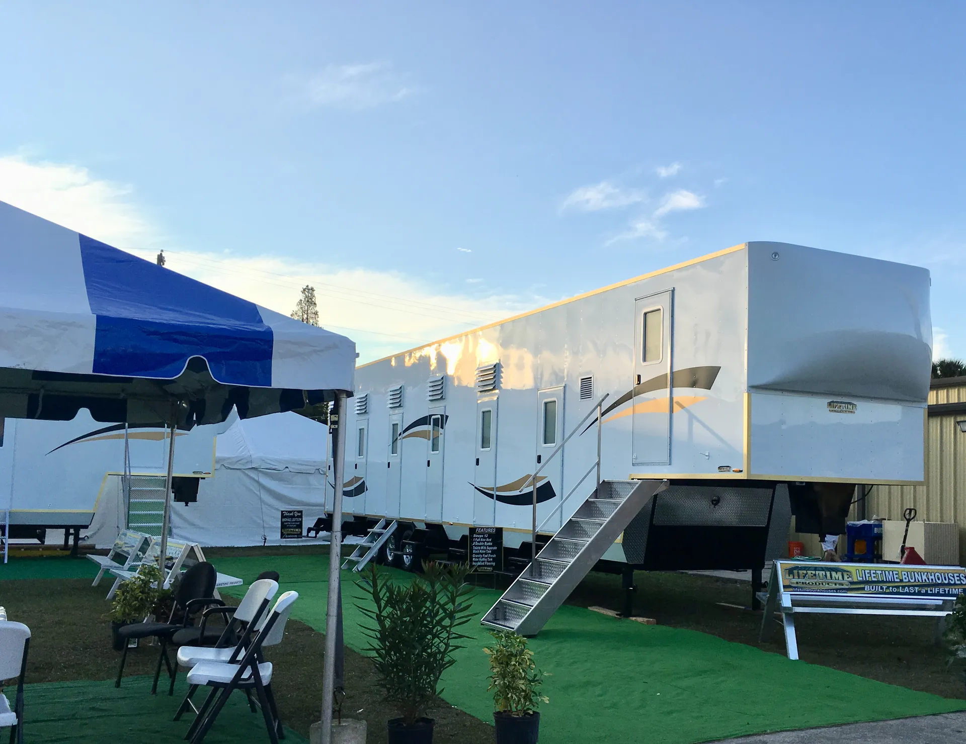 Lifetime fifth-wheel bunkhouse displayed with aluminum entry steps