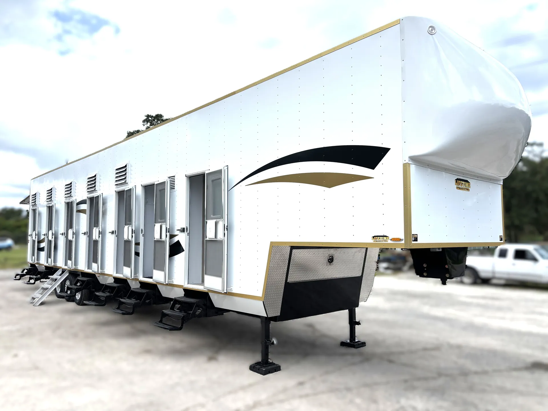 Finished Lifetime fifth-wheel bunkhouse with multiple room entrances